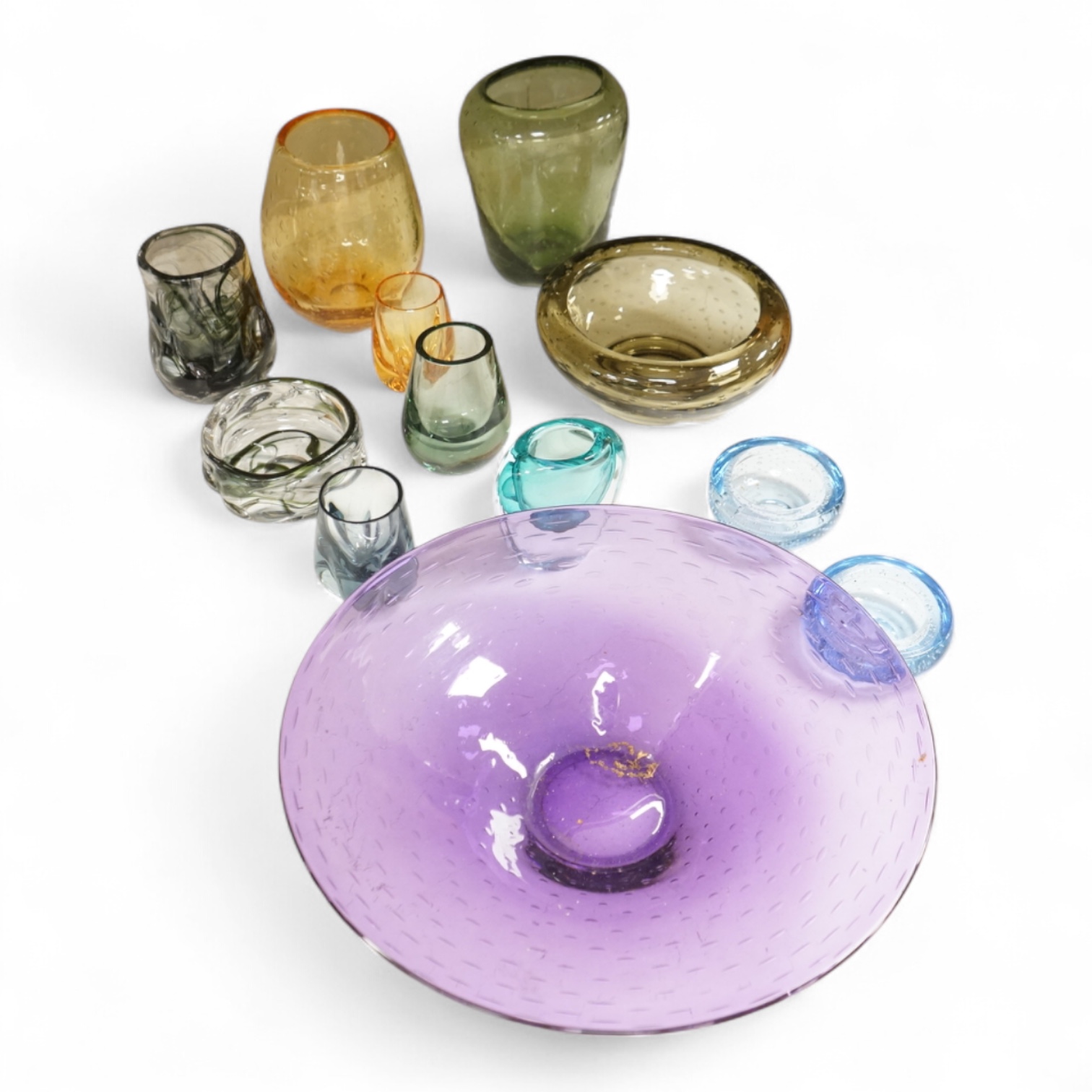 A collection of mixed coloured Whitefriars ‘Controlled Bubble’ and ‘Knobbly’ glassware, largest 37cm high (12)